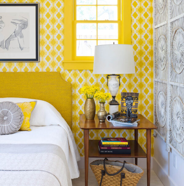 Annie Schlechter, Cameron Schwabenton, nobody, interior, indoors, modern, contemporary, bedroom, guest room, bedroom, colour, yellow, bright yellow, primrose yellow, gold, grey, wall covering, wallpaper, natural wall covering, rattan, bed, double bed, upholstered, headboard, wood, table, bedside table, lighting, lamp, table lamp, painted, soft furnishing, cushion, bedding, bed cover, bed linen, objects, fresh, texture, creativity, ideas,