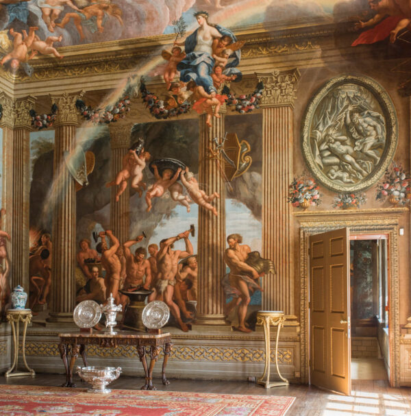 Harry Cory Wright; Burghley House; indoors; interior; nobody; stately home; historic house; English; artwork; mural; ceiling; painted ceiling; Antonio Verrio; flooring; wood floor; door; open door; carpet; table; pedestal table; console table; anteroom